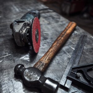 Dirty, rusty tools on a workbench