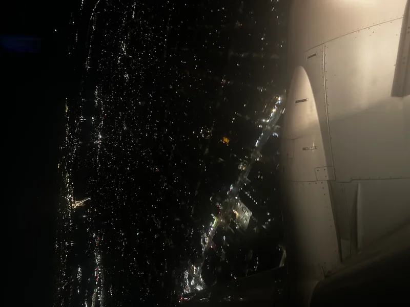 Night cityscape view from airplane