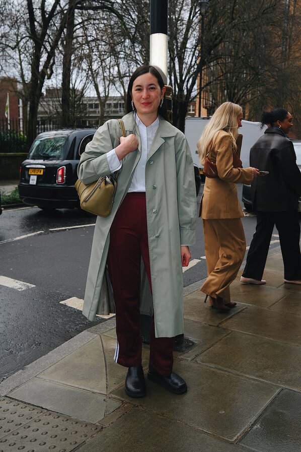 Guest attends the Burberry Spring Summer 2024 show during London Fashion Week