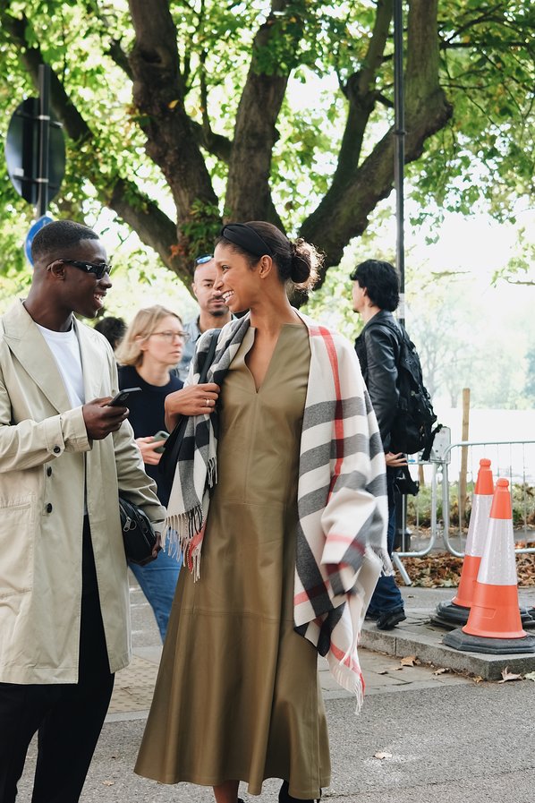 Guests attend the Burberry Spring Summer 2024 show during London Fashion Week