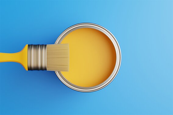 paint bucket with brush on top