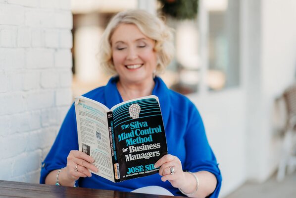 Amy Schneider reading the Silva Mind Control Method for Business Managers by Jose Silva