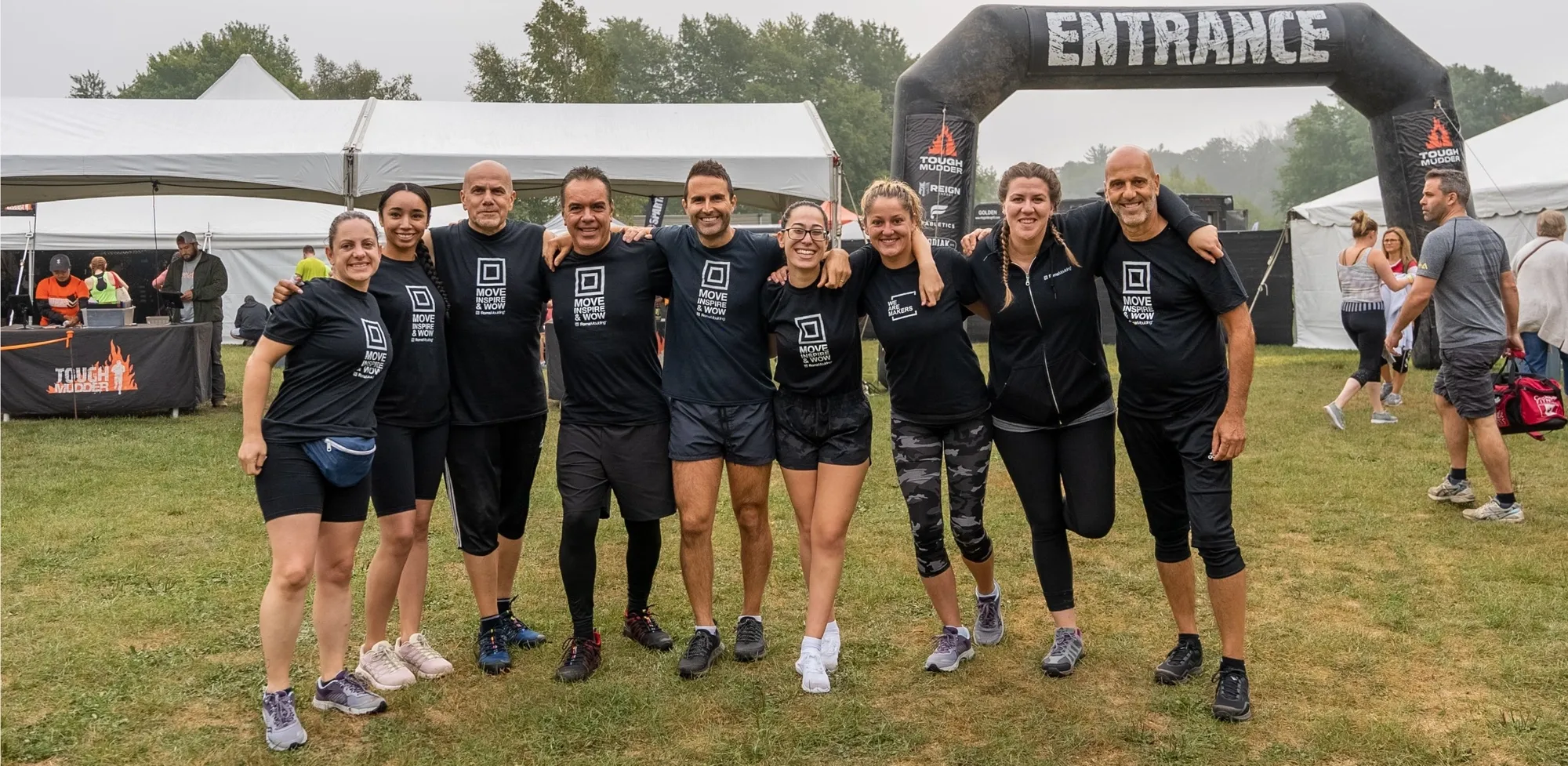 Roma staff competing in Tough Mudder competition