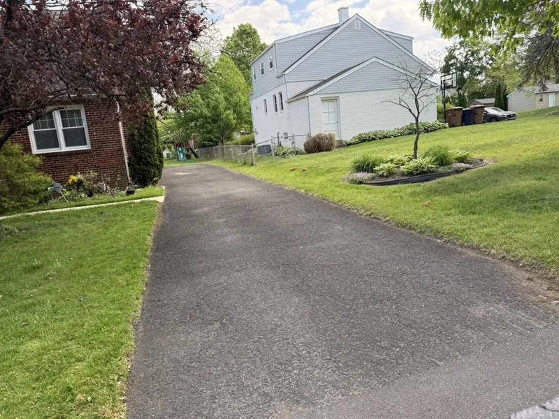 Double-wide driveway sealcoating before PureSeal sealcoating
