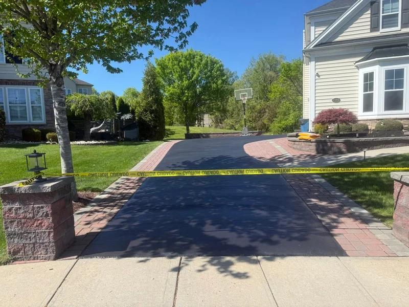 Decorative paver driveway sealing after PureSeal sealcoating