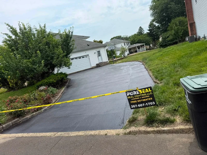 Driveway crack repair and sealing after PureSeal sealcoating