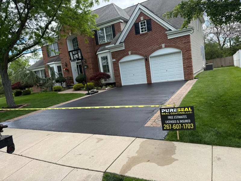Brick home driveway refresh before PureSeal sealcoating