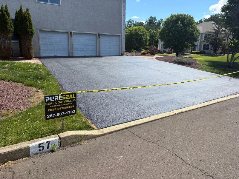 Three-car driveway restoration after PureSeal sealcoating