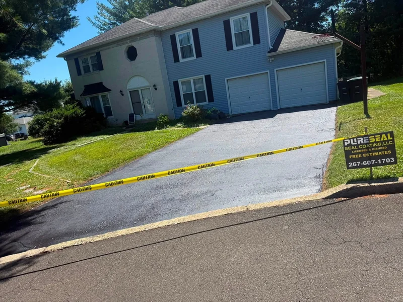 Two-car driveway restoration after PureSeal sealcoating