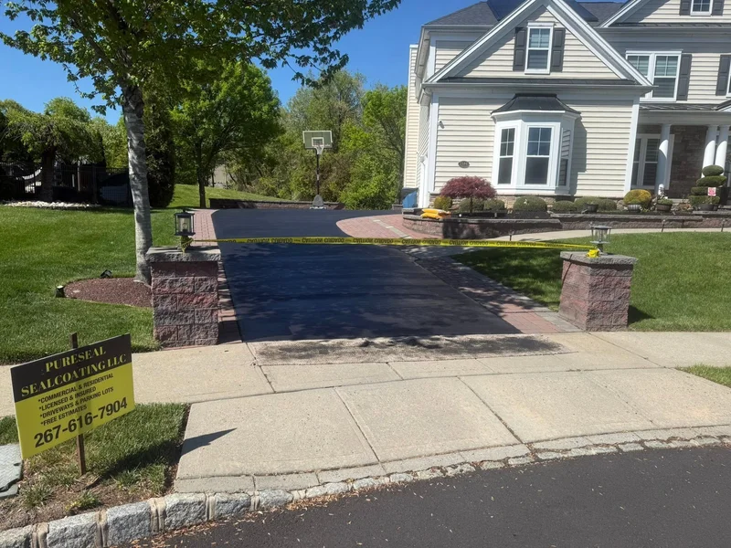 Garage approach sealcoating before PureSeal sealcoating