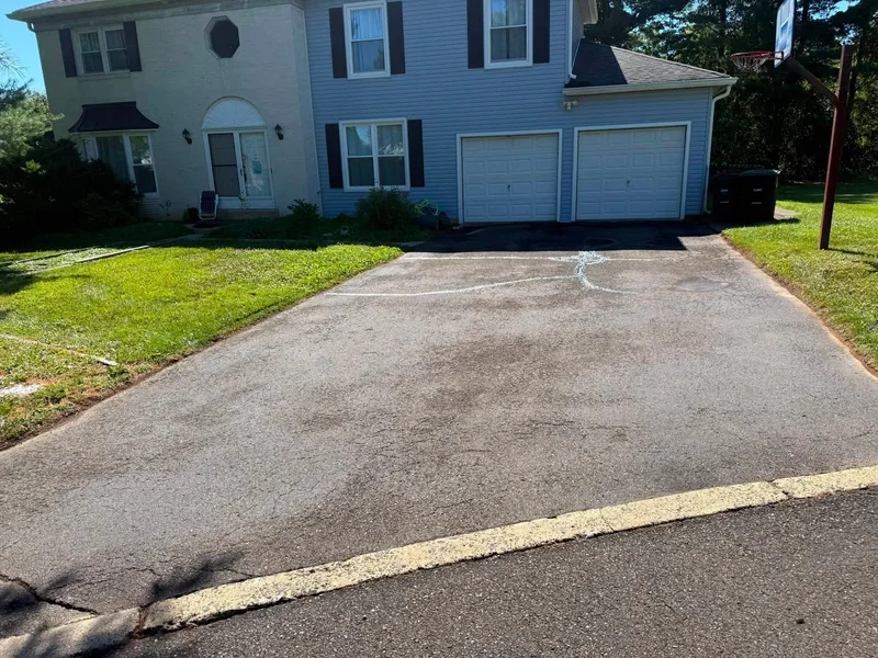 Two-car driveway restoration before PureSeal sealcoating