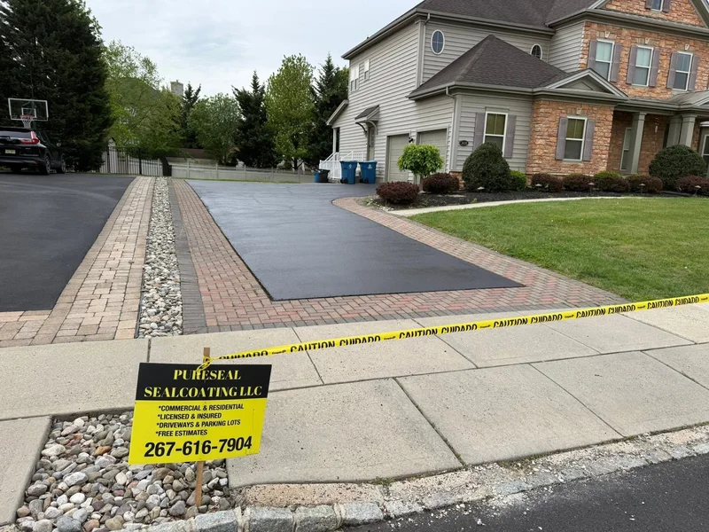 Paver-accent driveway restoration before PureSeal sealcoating