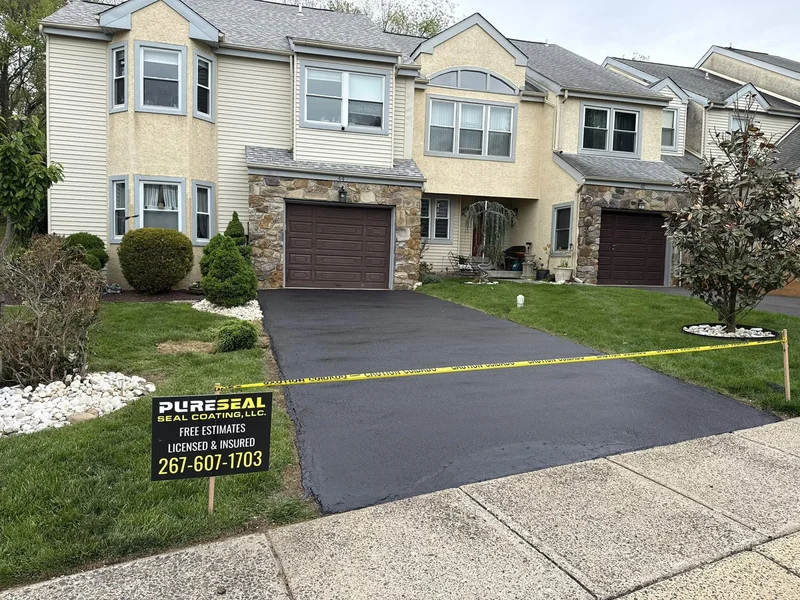 Paver-accent driveway restoration after PureSeal sealcoating