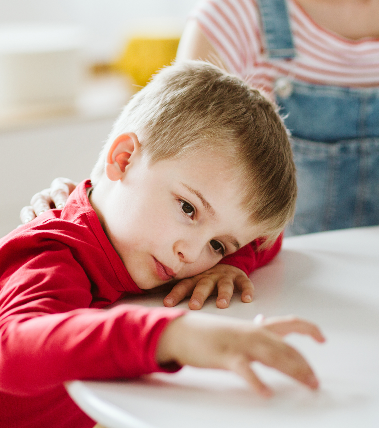 A child resting during a difficult moment