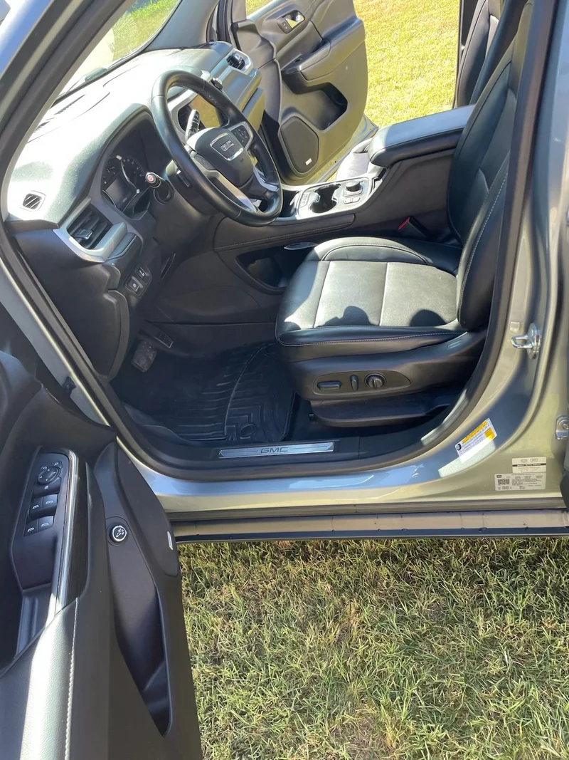 Clean truck interior with detailed driver seat and console
