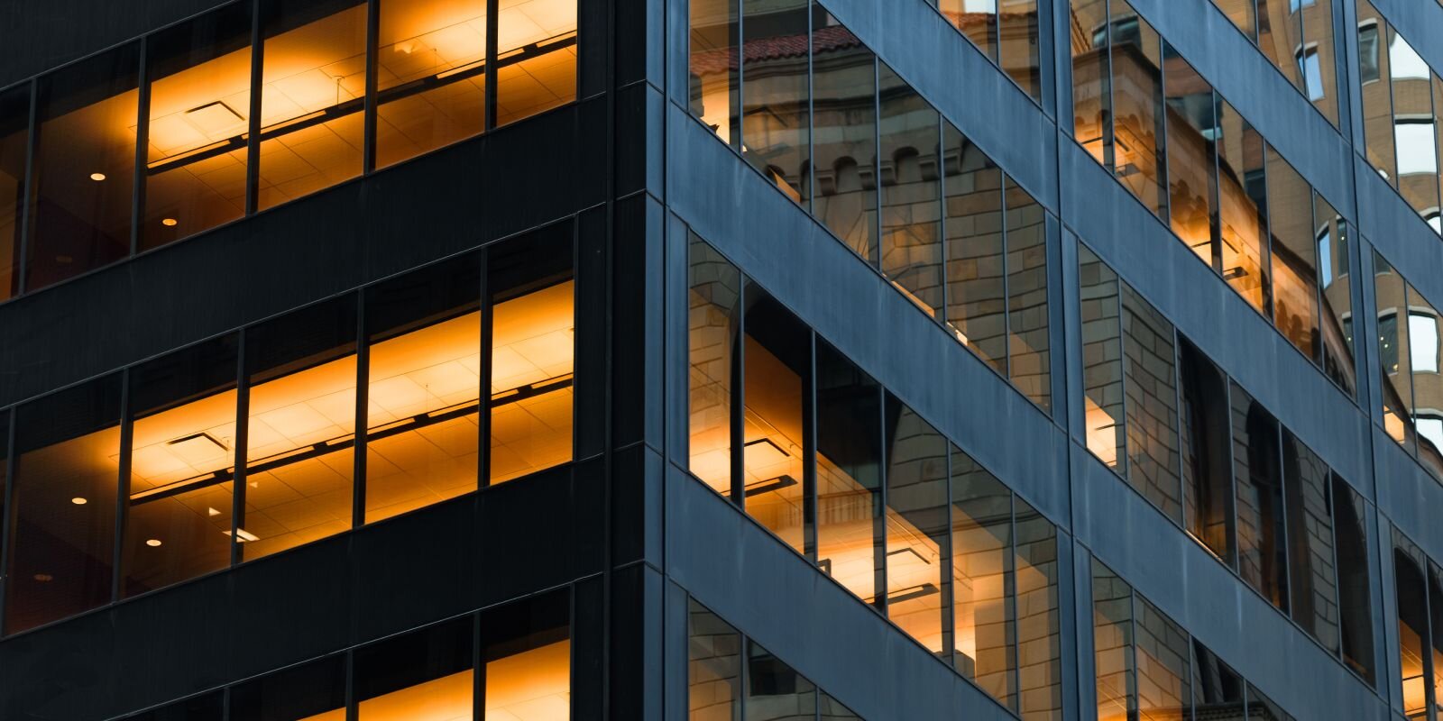 "Close up view of a black building with windows"