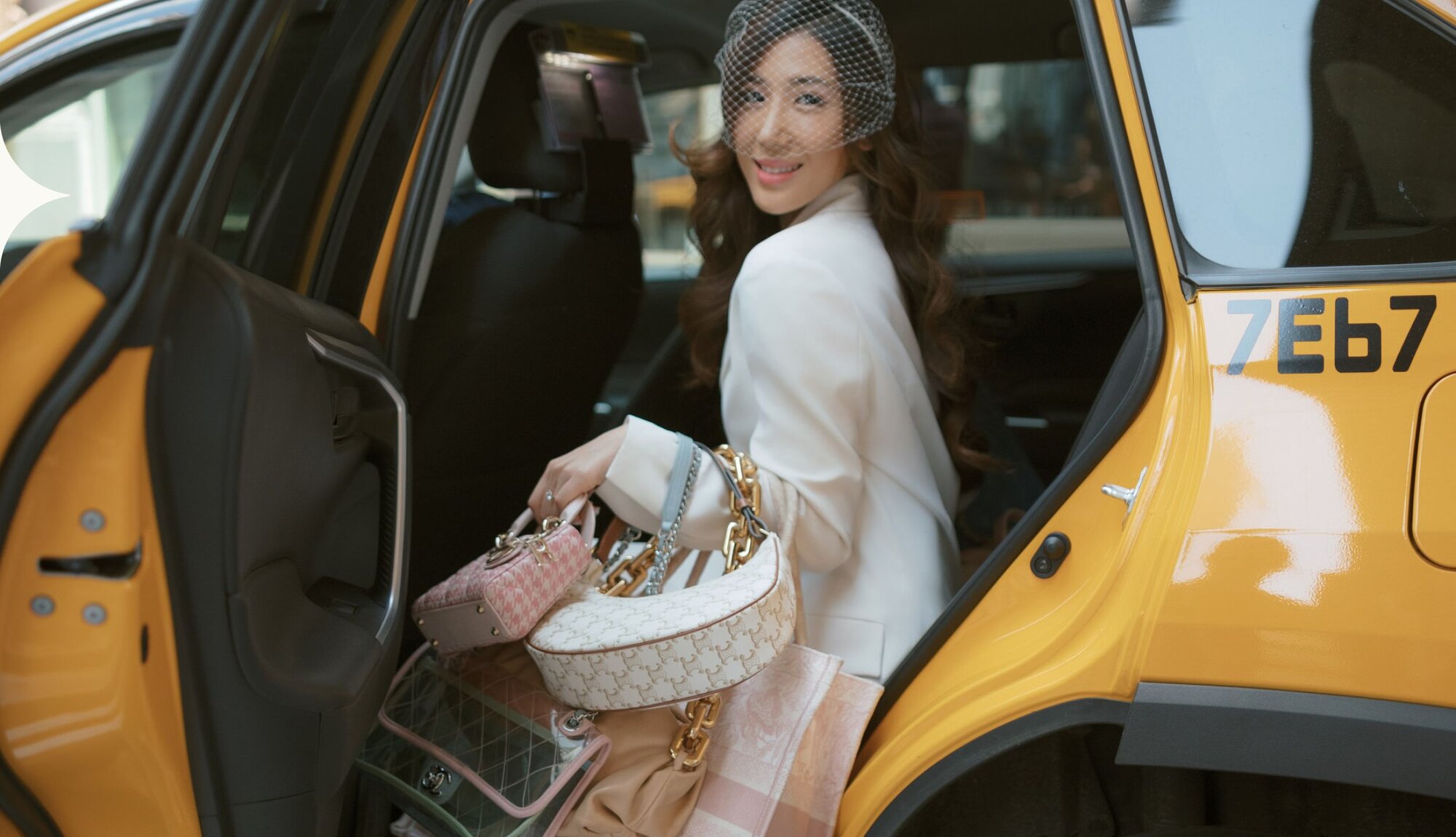 Image of woman with bridal bag styles from Vivrelle.