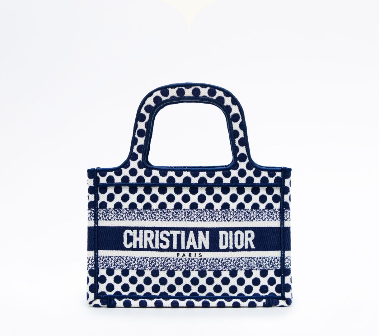 Blue Christian Dior bag from Vivrelle.