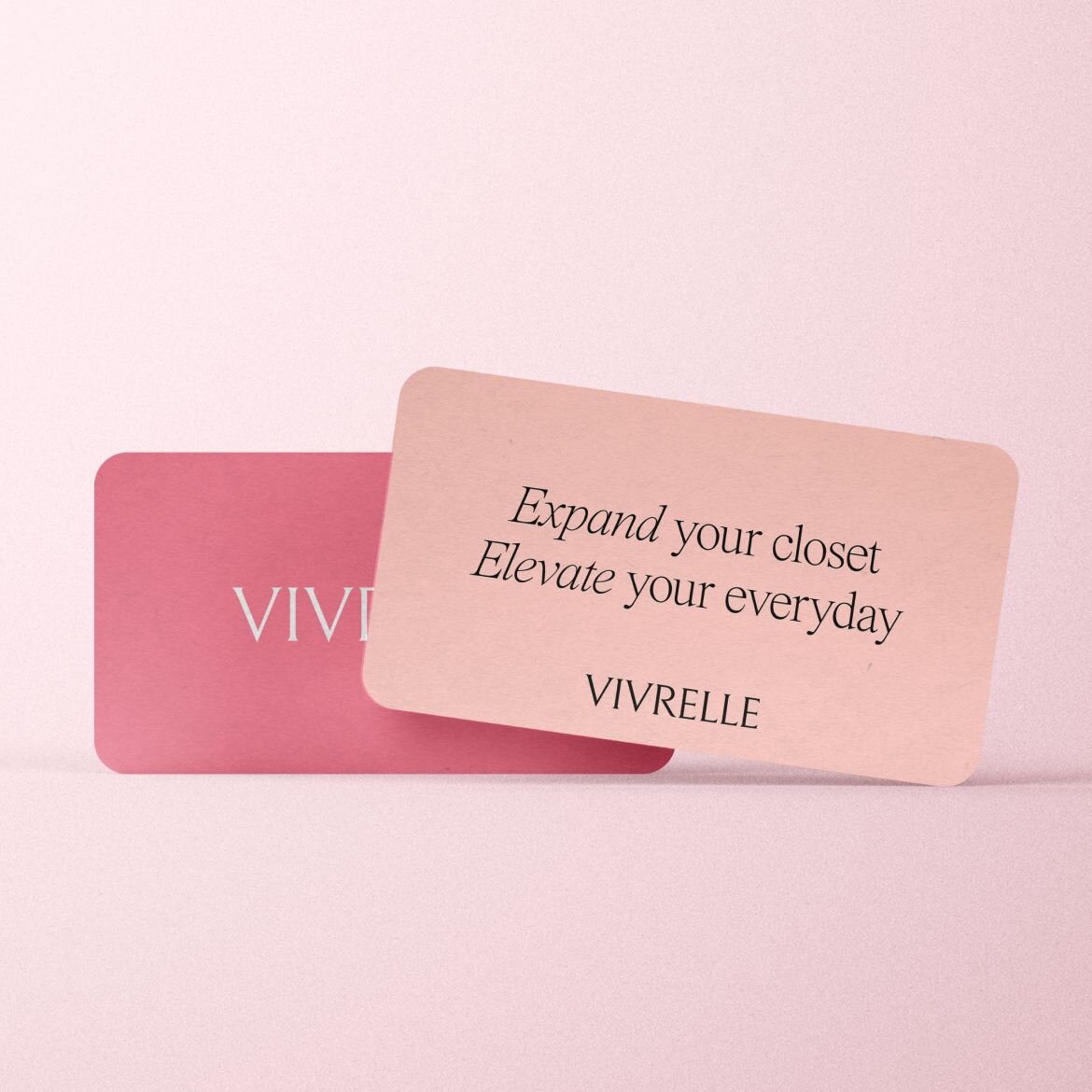 Image of women holding luxury handbags and wearing jewelry from Vivrelle.