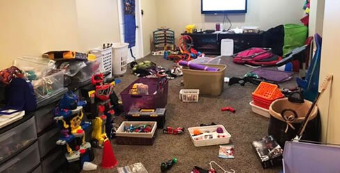 messy kids playroom before