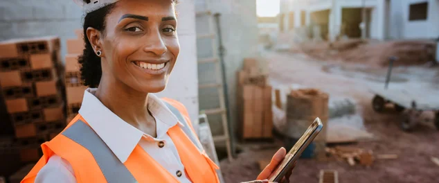 Retrato de uma mulher no canteiro de obras