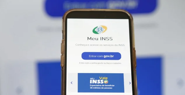 Aplicativo inicial do Meu Inss do governo na tela de um celular pronto para consultar beneficios do cidadão.