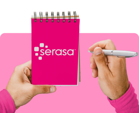 Bloco de notas rosa com logo do Serasa