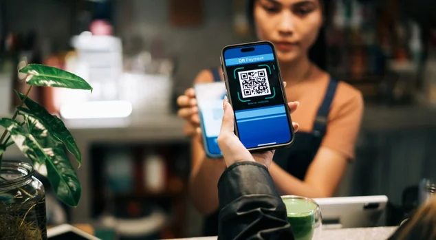 Cashless Transaction at Coffee Shop Using QR Code on Smartphones