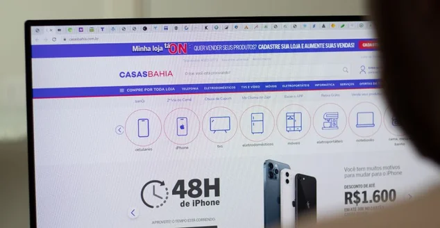 Site da empresa Casas Bahia em tela, Editorial Ilustrativo.