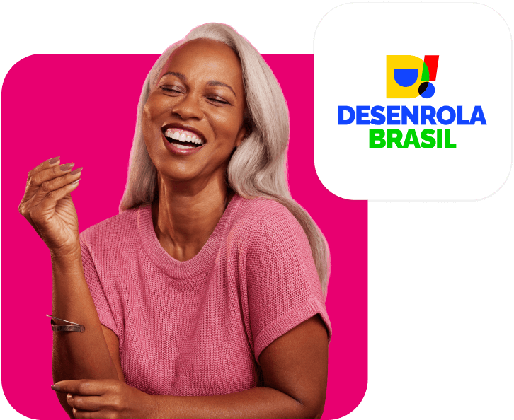 Mulher de meia idade sorrindo com o símbolo do desenrola Brasil