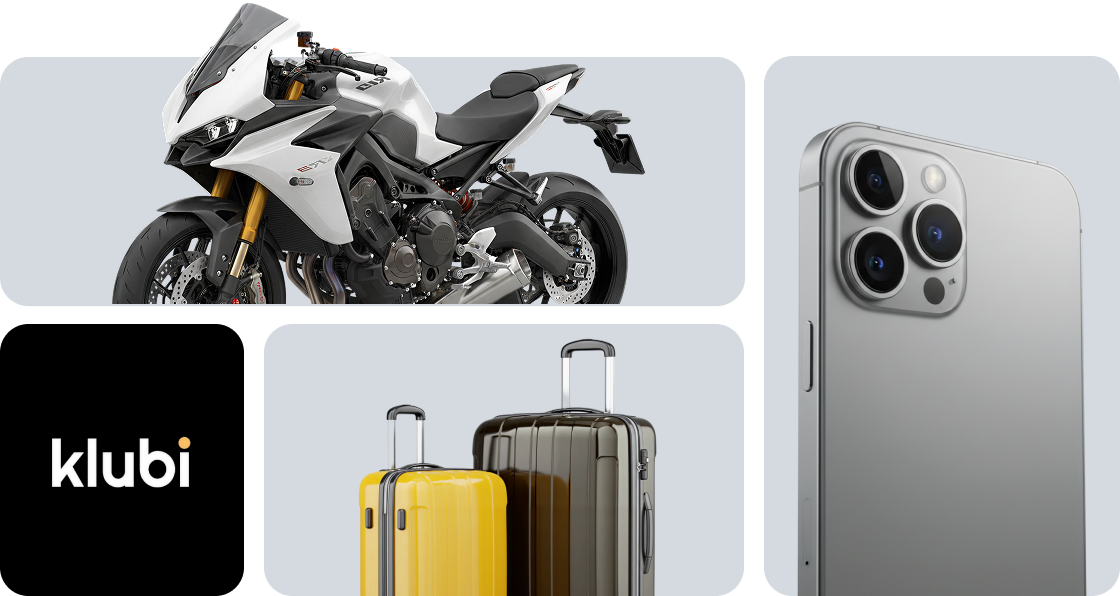 Mala de viagem rosa ao lado de uma motocicleta esportiva prata e um smartphone rosa apoiado na vertical.