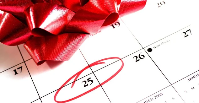 Calendário do fotômetro circulados no dia 25 de dezembro, laço de presente vermelho de Natal