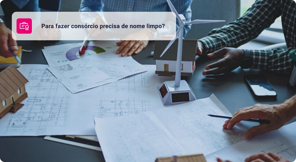 Equipe de profissionais discute a construção de moradias suburbanas