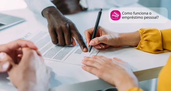 Business people signing a contract in the office.