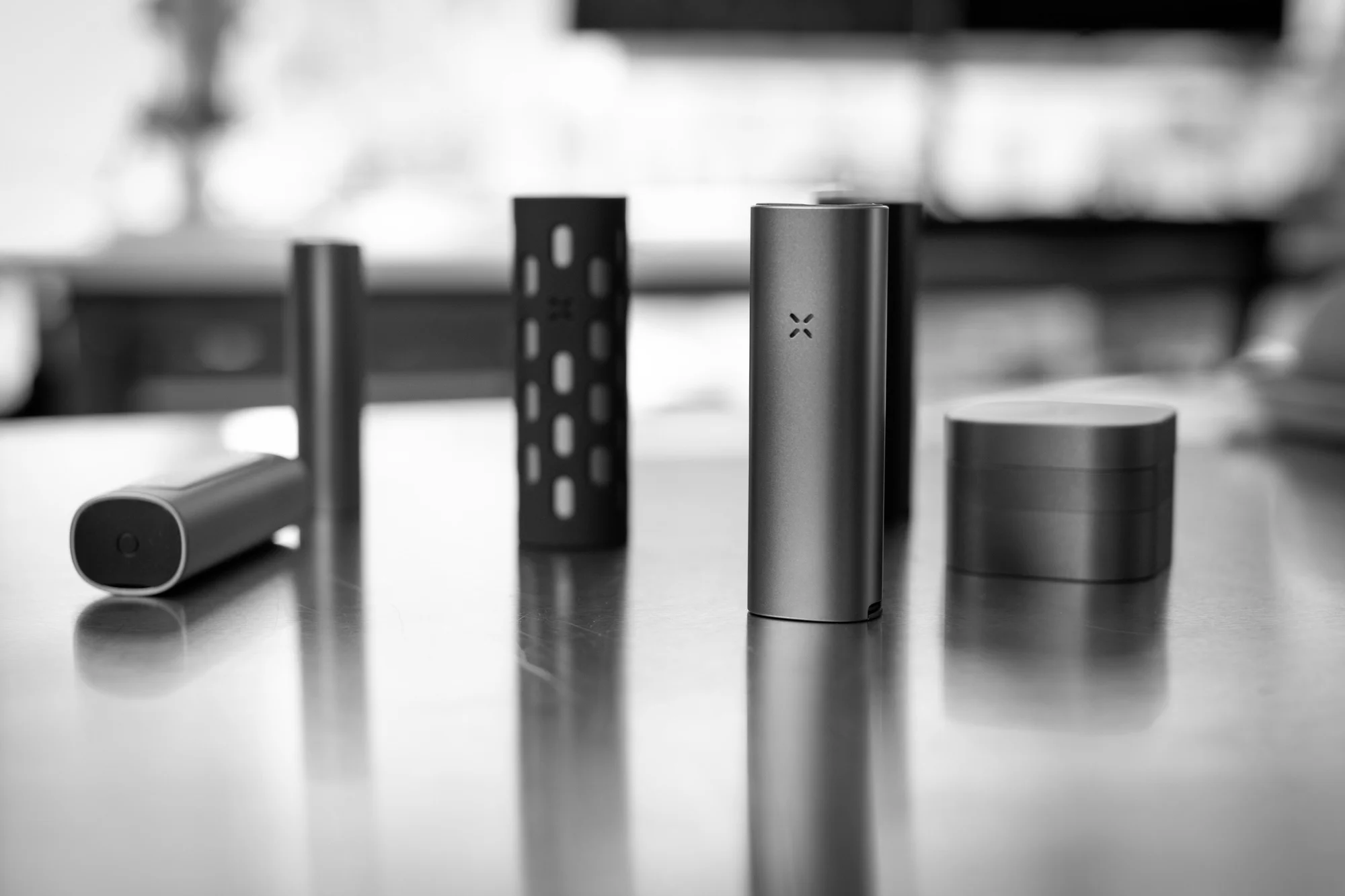 PAX Labs lab coats hanging on hooks