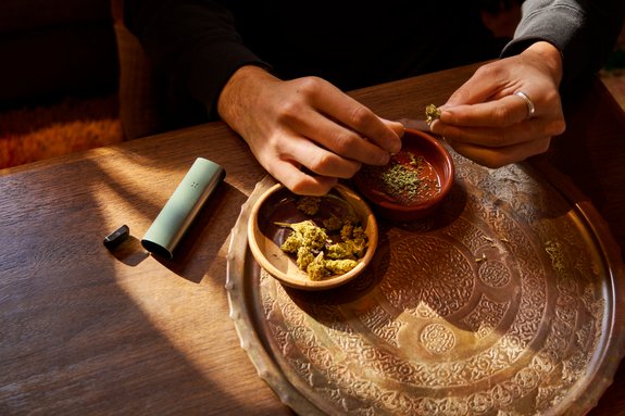 Grinding up some fresh cannabis flower