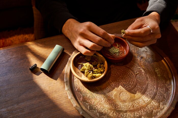 Grinding up some fresh cannabis flower