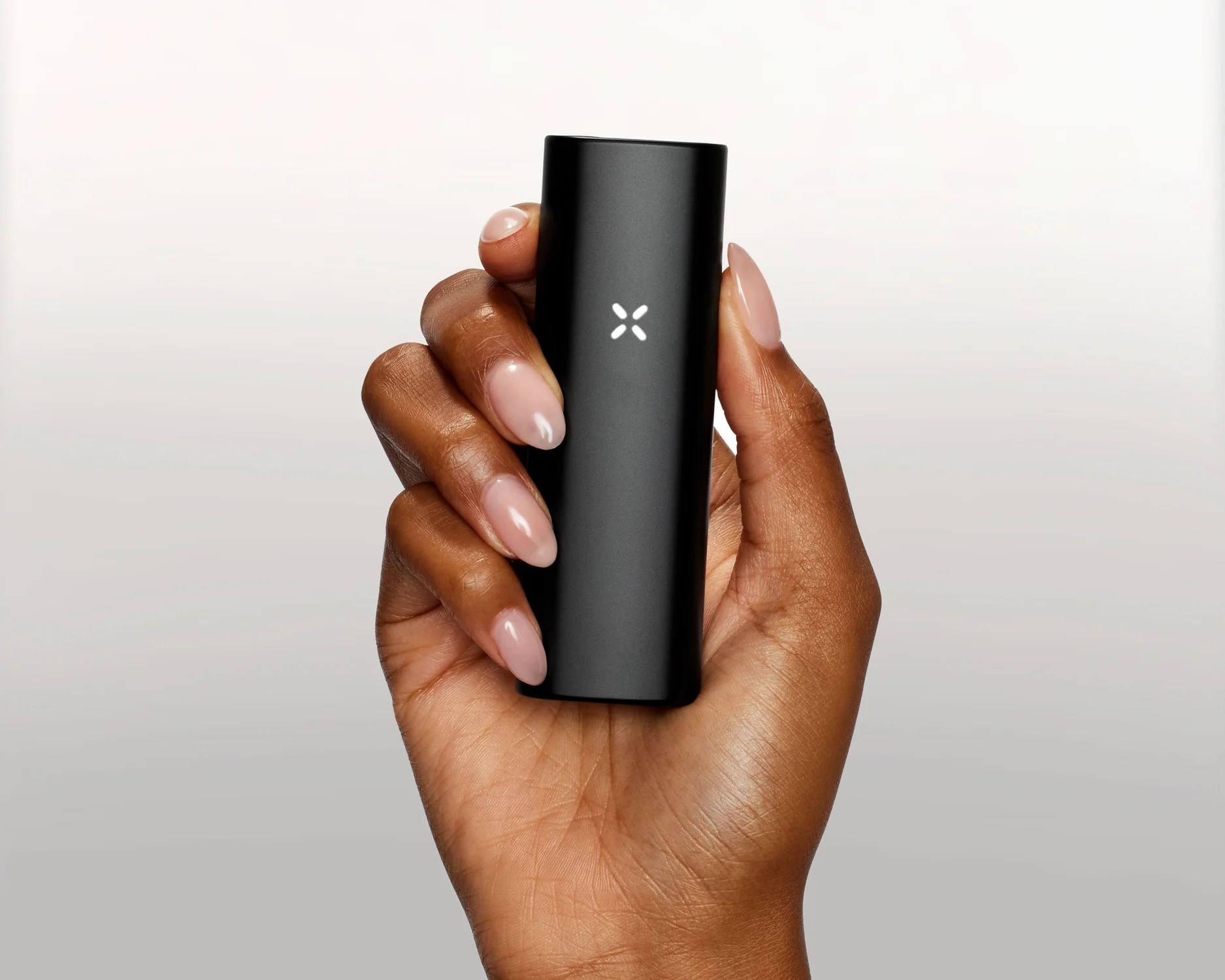 Hand Holding a PAX