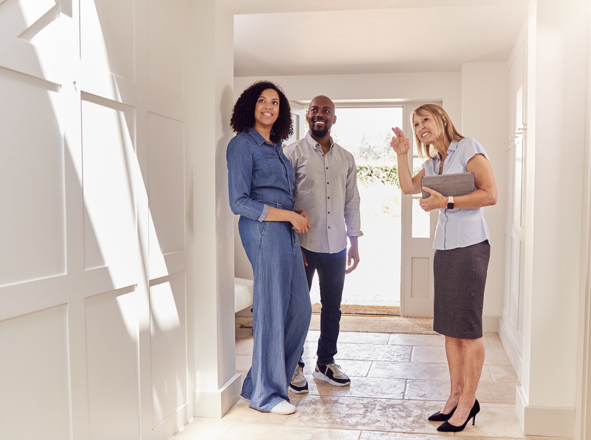 Agent and Homebuyer Touring a Home