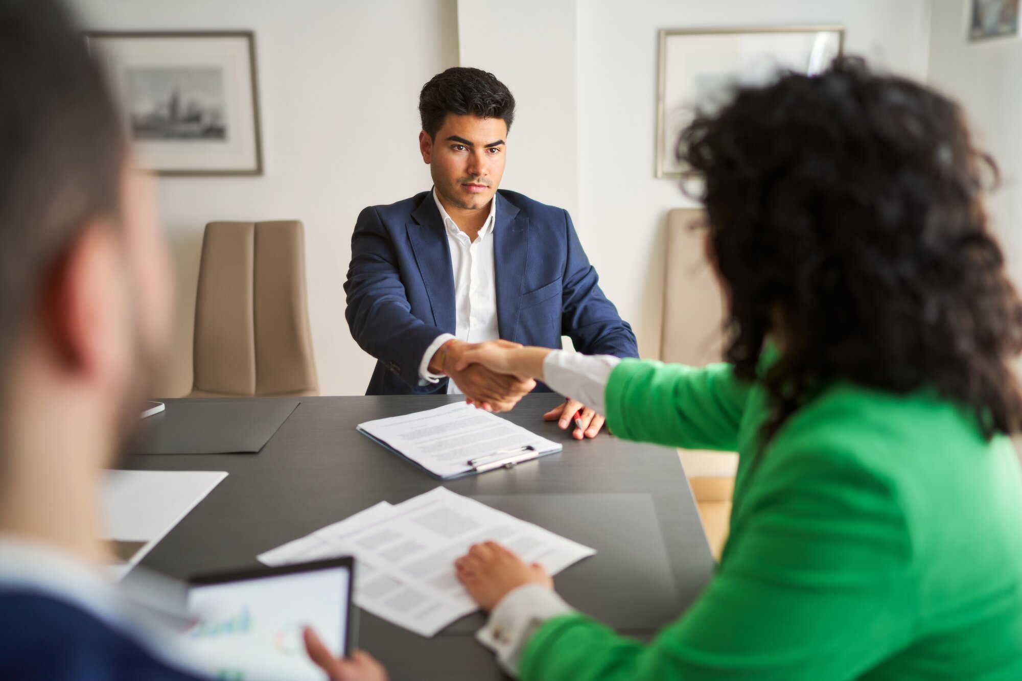 Homebuyers closing on a home purchase.