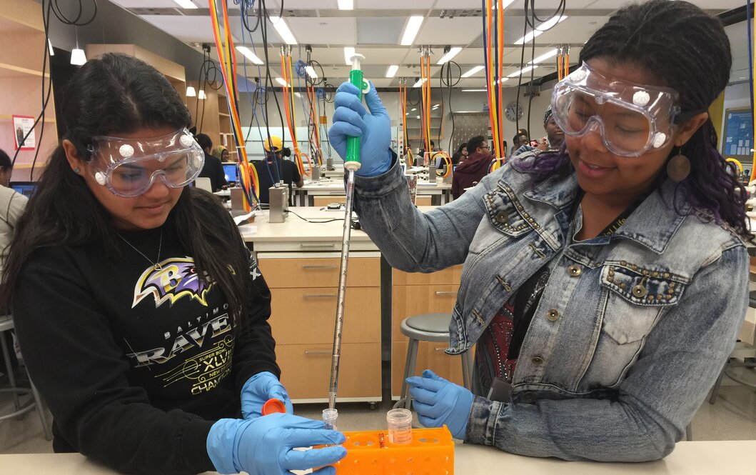 Victoria Baskerville and BUILD Training Program colleague, Isis Cabassa, preparing dilutions in class.