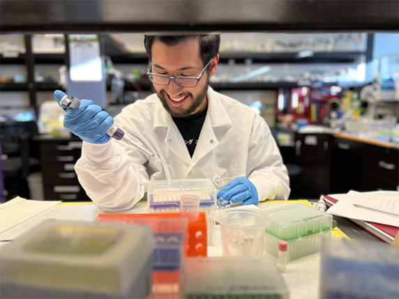 SFSU sophomore Juan Rojas doing research in a lab