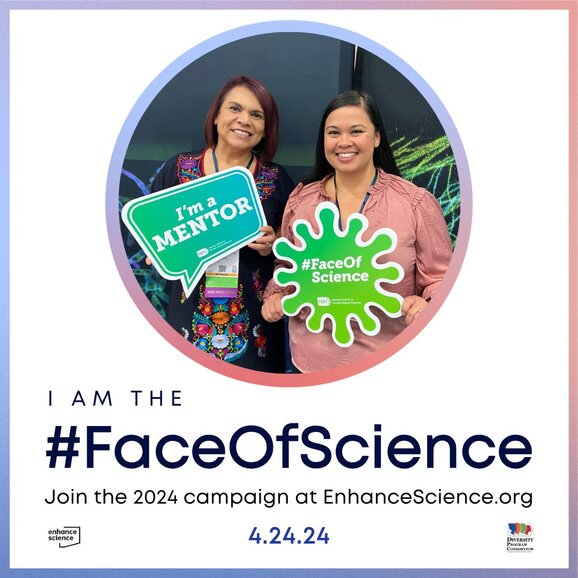 Dr. Gabriela Chavira and Mirranda Salas holding signs that read “I’m a Mentor” and “#FaceOfScience