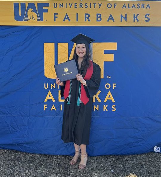 Samantha Wade at her graduation ceremony at UAF, where she earned aB.S. in Biological Sciences in May 2022