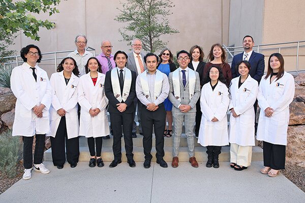 Group photo of spring ’24 BUILD graduates (front center) with ’24-’25 cohort and BUILD PIs (back row)