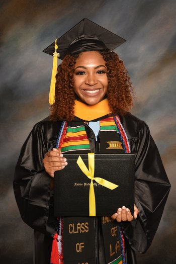 Photo of Tyler Alexander, smiling in her graduation cap and gown. She is holding up her diploma proudly. Text: BUILDing Future Researchers Tyler Alexander - 2022 Graduates Share Their Stories - EPISODE #3