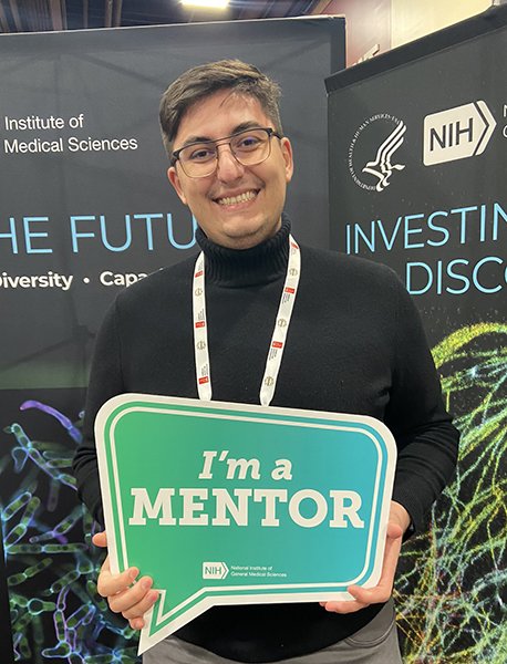 UAF RAMP staff member Nikola Nikolic poses for a photo at the 2023 Annual Biomedical Research Conference for Minority Students.