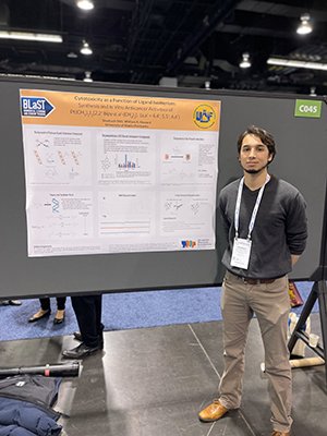 Stitz presenting his research at the 2022 Annual Biomedical Research Conference for Minoritized Students (ABRCMS), Anaheim, California. (Photo Credit: Tyler Baker-Chapman, 2022)