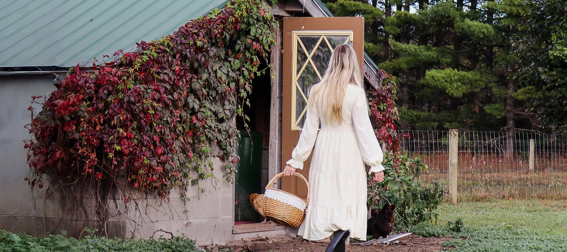 Truly Free Laundry Wash and refill pouch in a laundry room, with a woman and baby in the background.