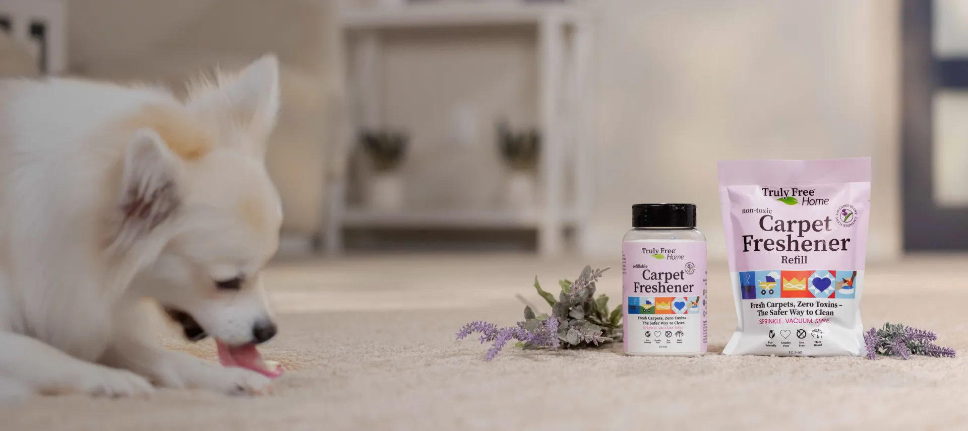 Truly Free Laundry Wash and refill pouch in a laundry room, with a woman and baby in the background.